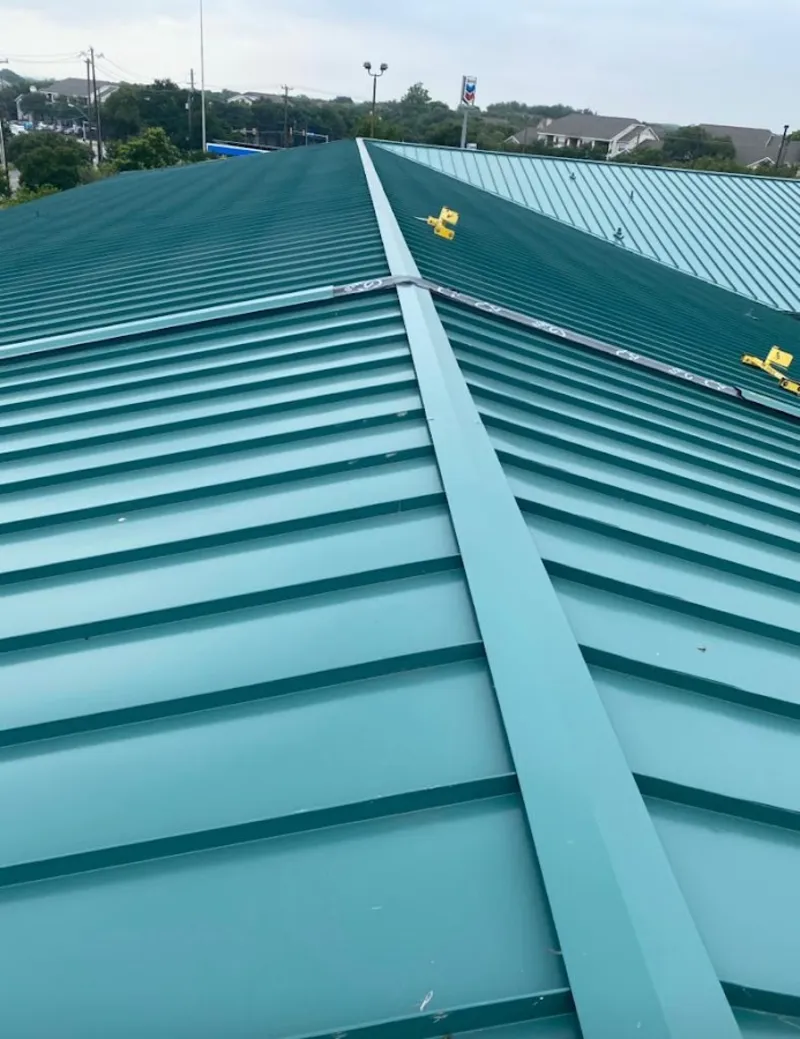 Green commercial metal roof ridge and valley for Metal Roof Repair in Jamestown