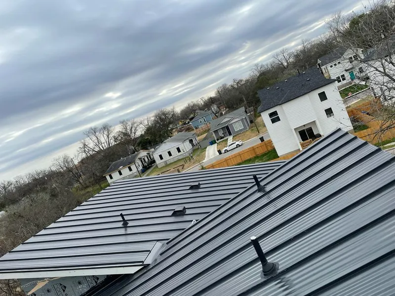Standing seam metal roof panels with vents for Skylight Repair in Jamestown